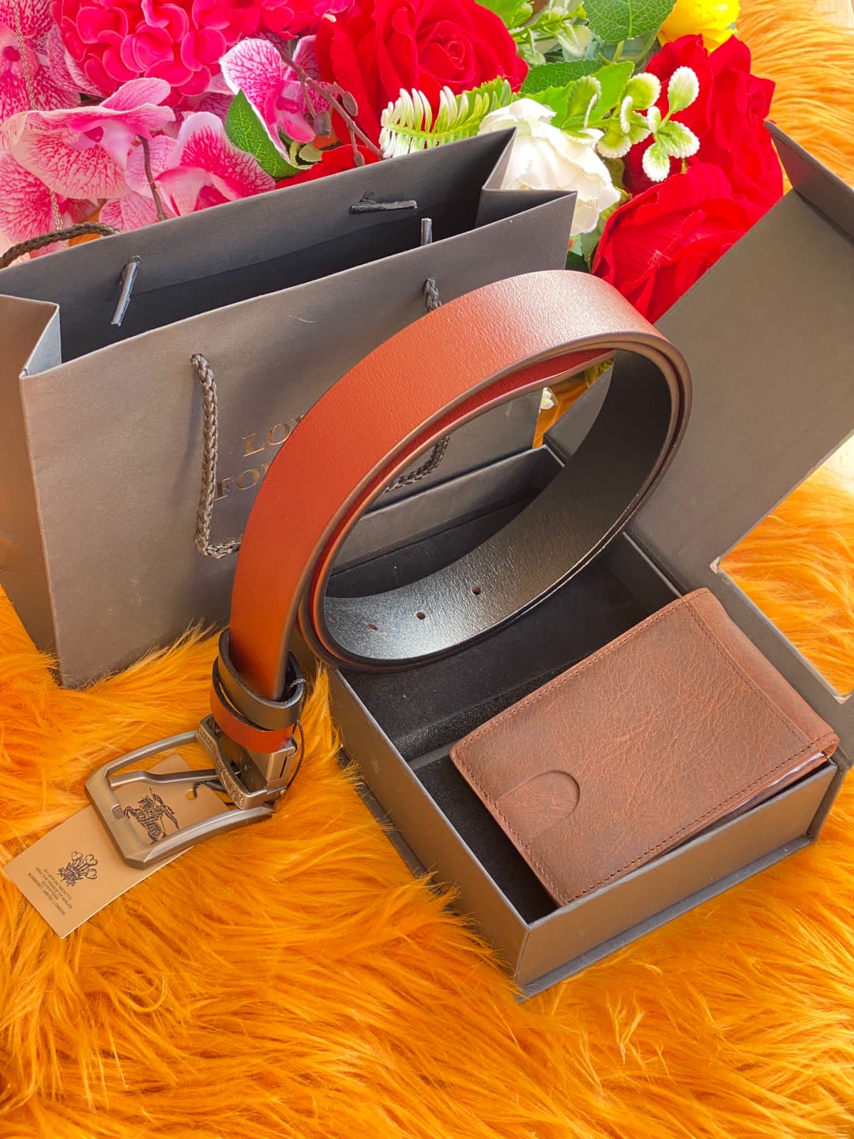 A DOUBLE SIDED LEATHER BELT AND A WALLET PACKAGE