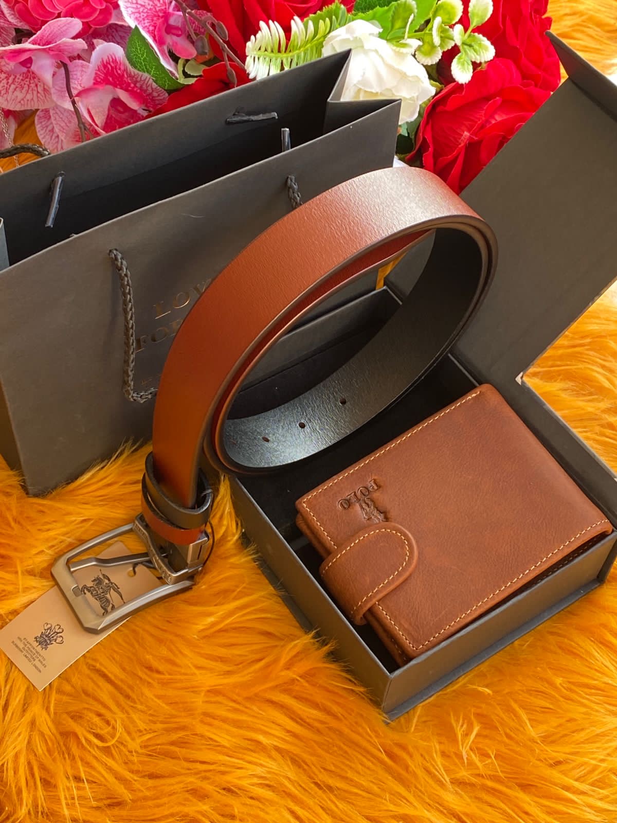 A DOUBLE SIDED LEATHER BELT AND A WALLET PACKAGE